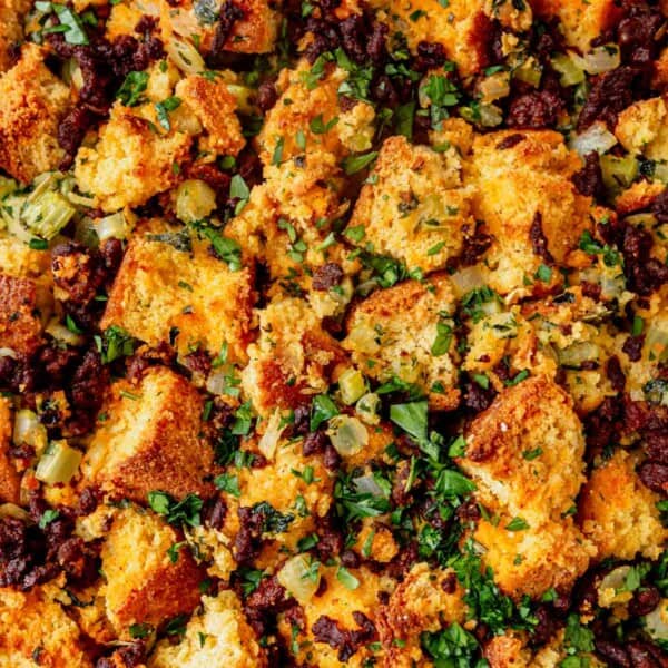 chorizo cornbread stuffing topped with fresh herbs.