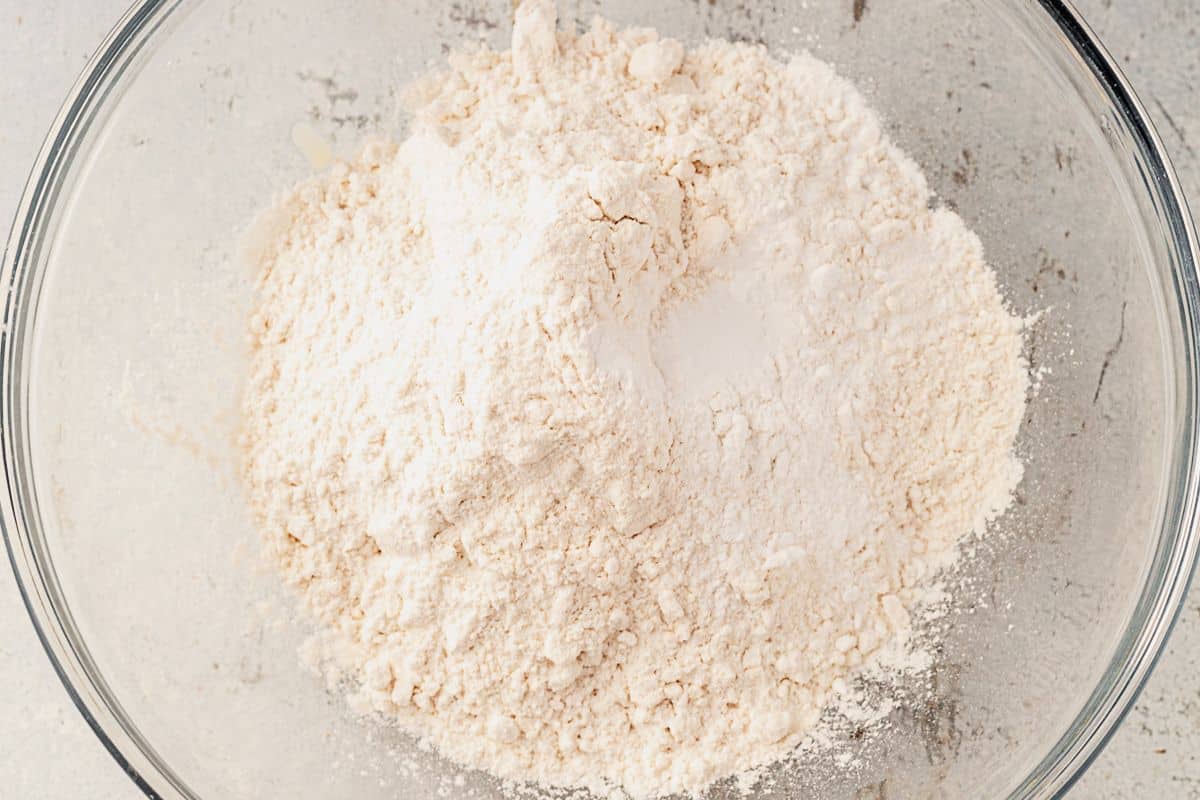 a bowl of flour, baking soda, and salt