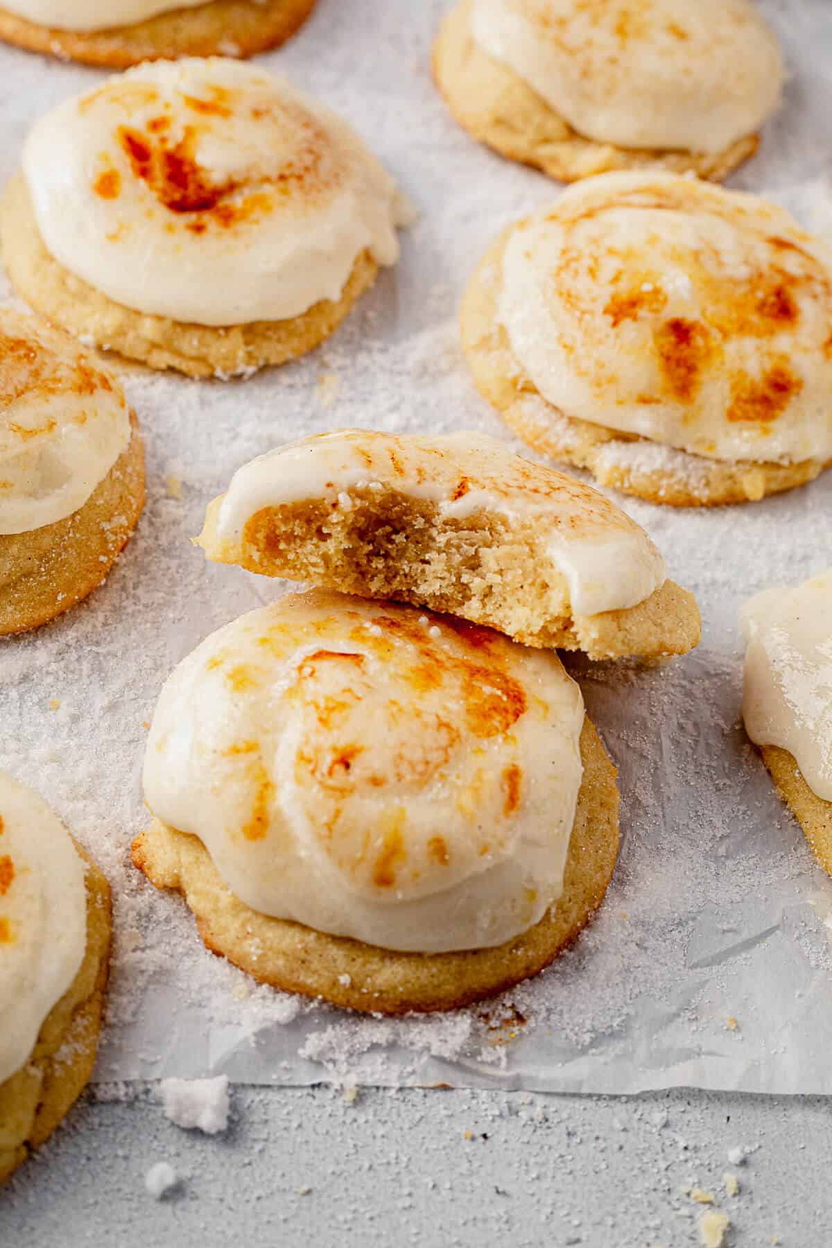 two creme brulee cookies sctacked on parchment paper