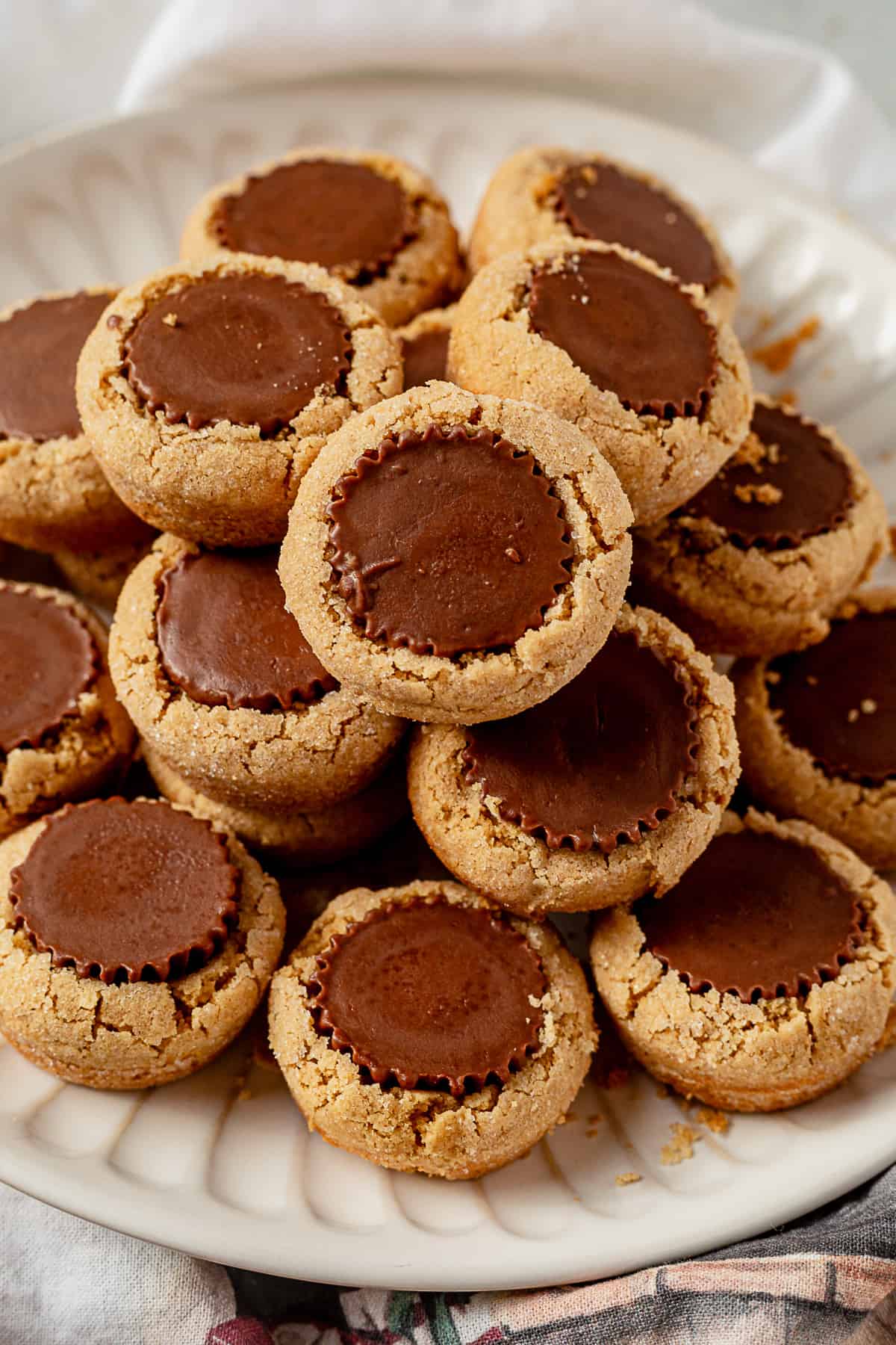 a plate of peanut butter cup cookies