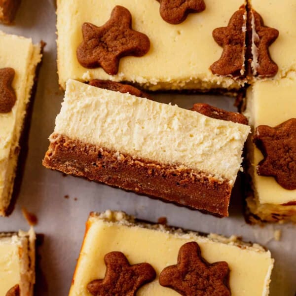 a gingerbread cheesecake bar laying on its side