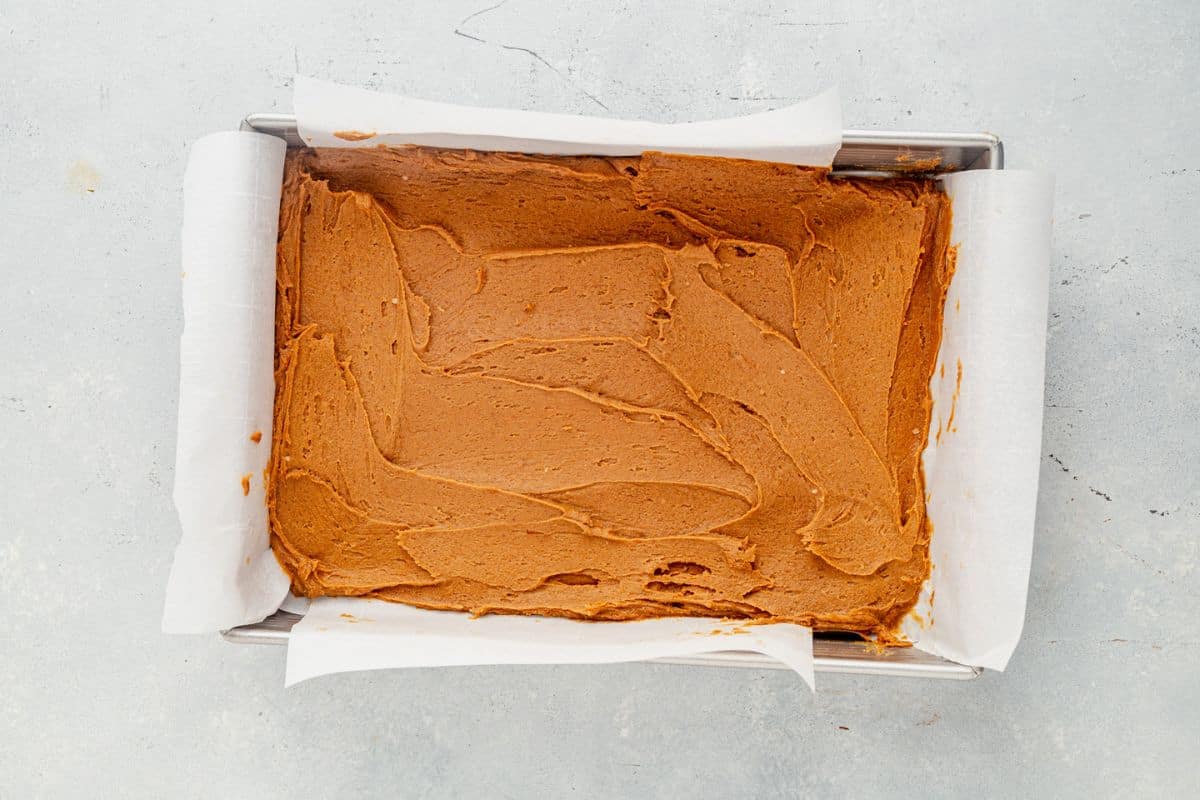 gingerbread cookie dough spread into a pan