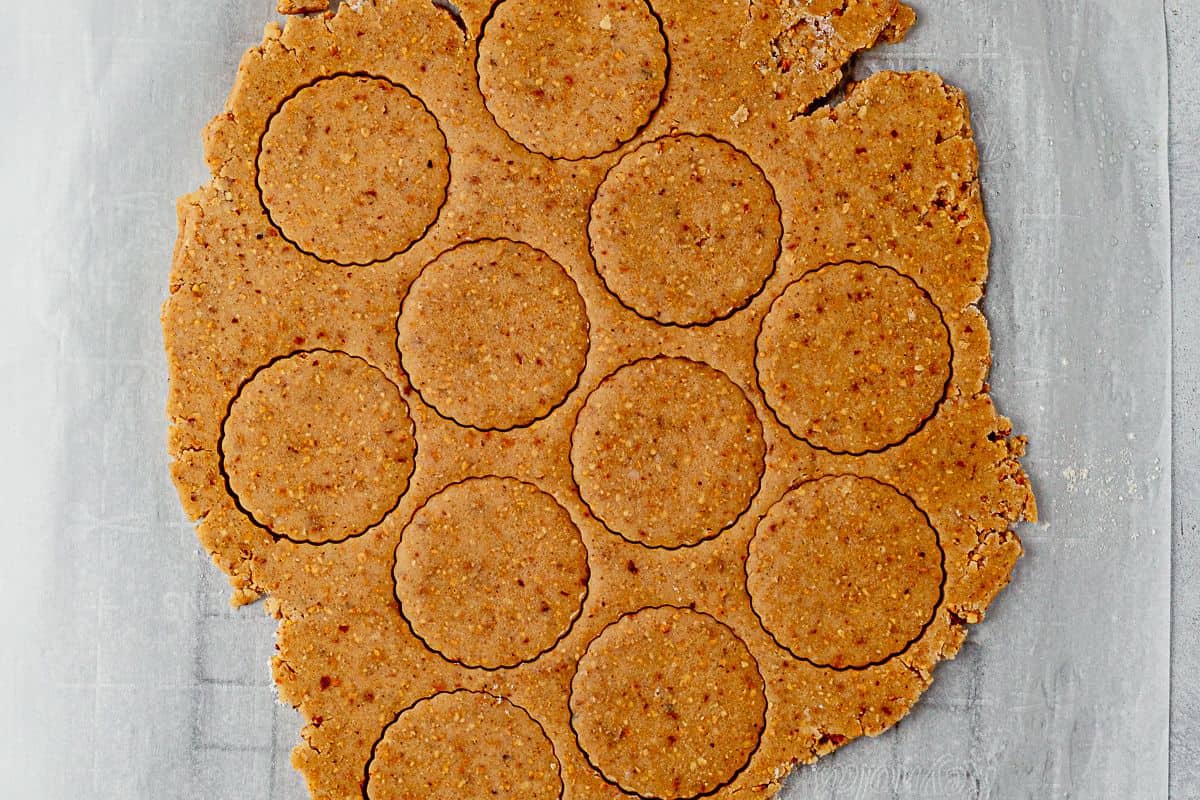 circles cut out of hazelnut shortbread dough