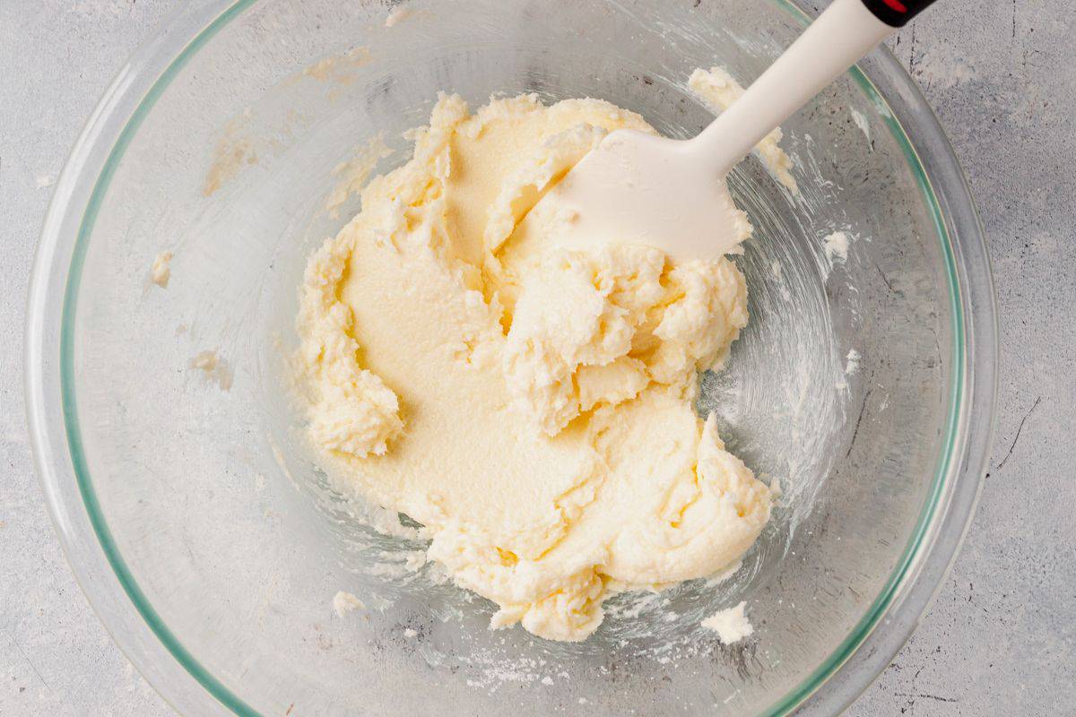 softened butter and sguar mixed in a bowl