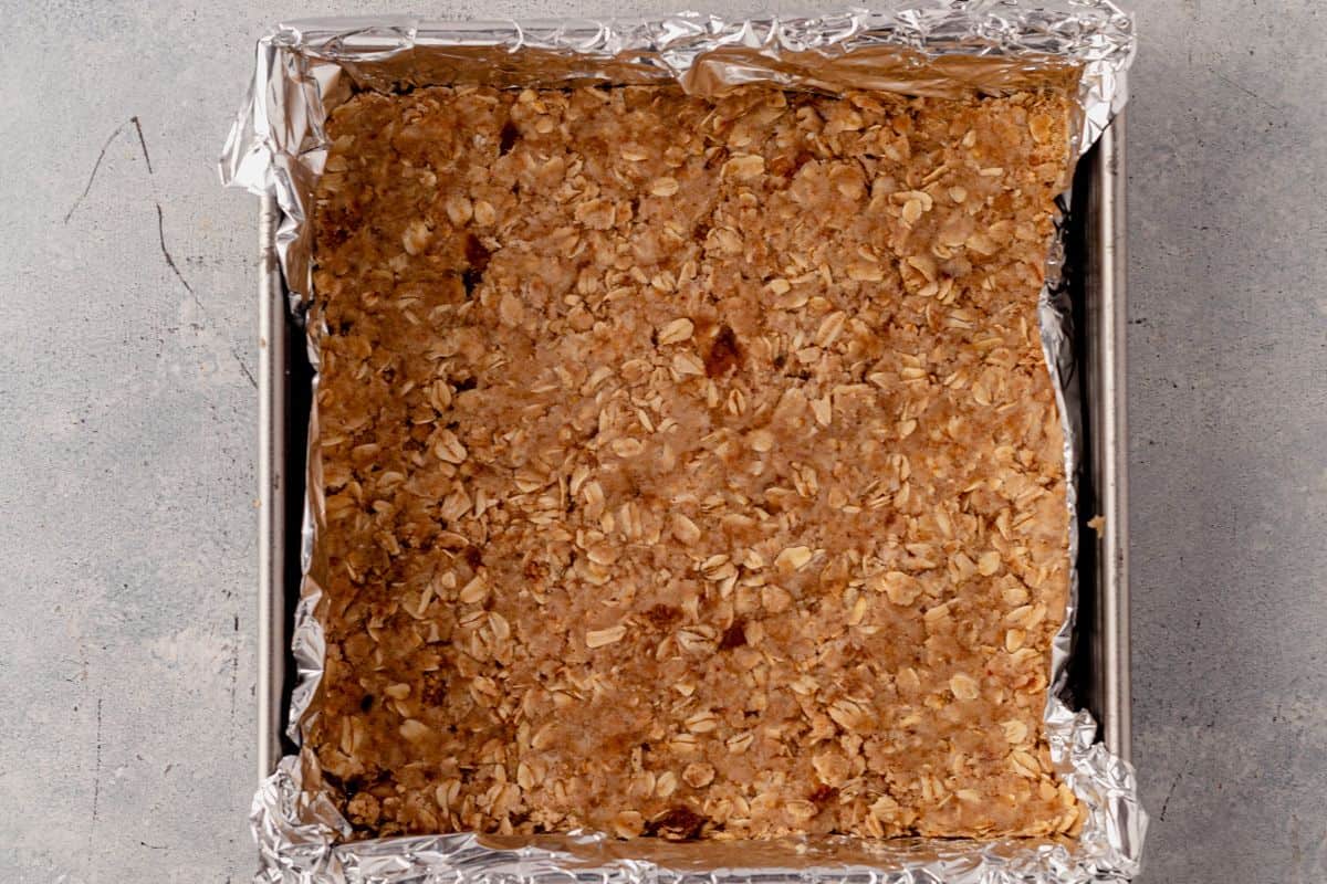 oatmeal brown sugar crumb pressed into a square pan