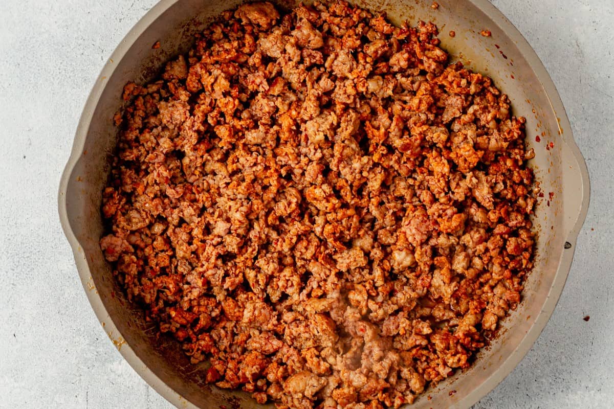 ground cooked chorizo in a skillet