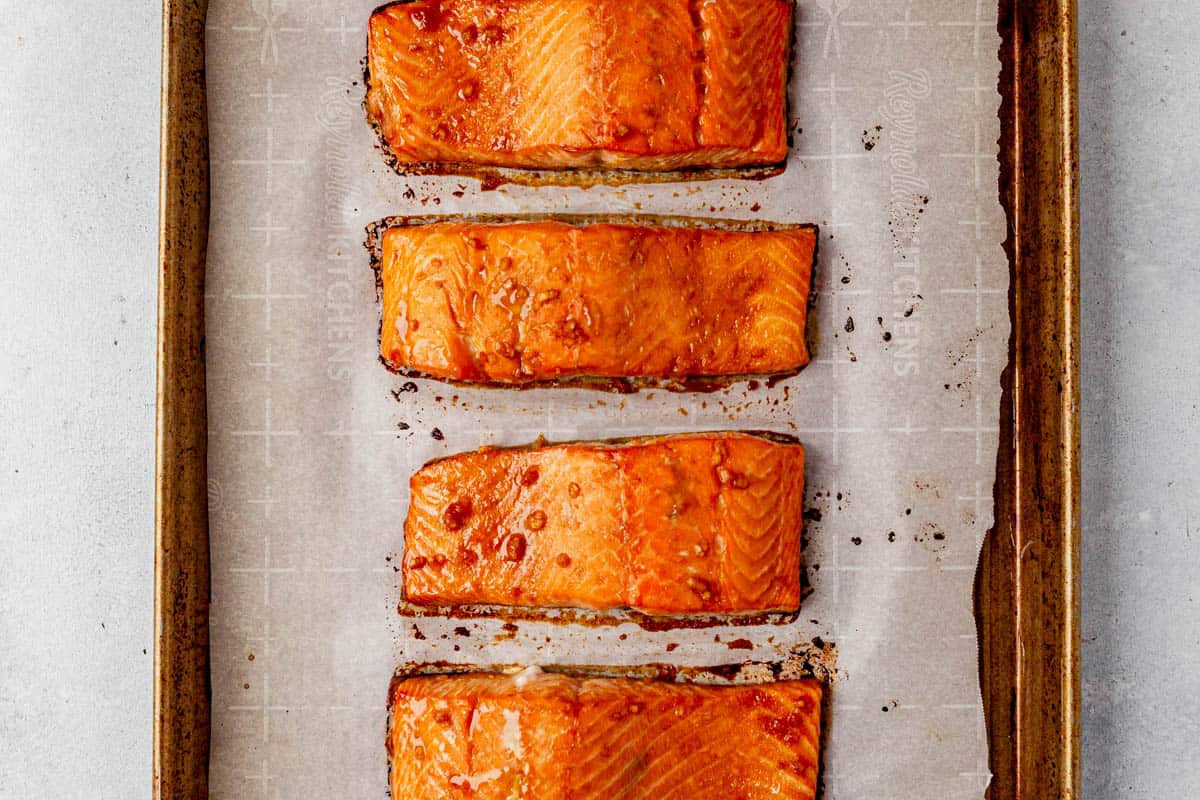 baked honey sriracha salmon on a sheet pan