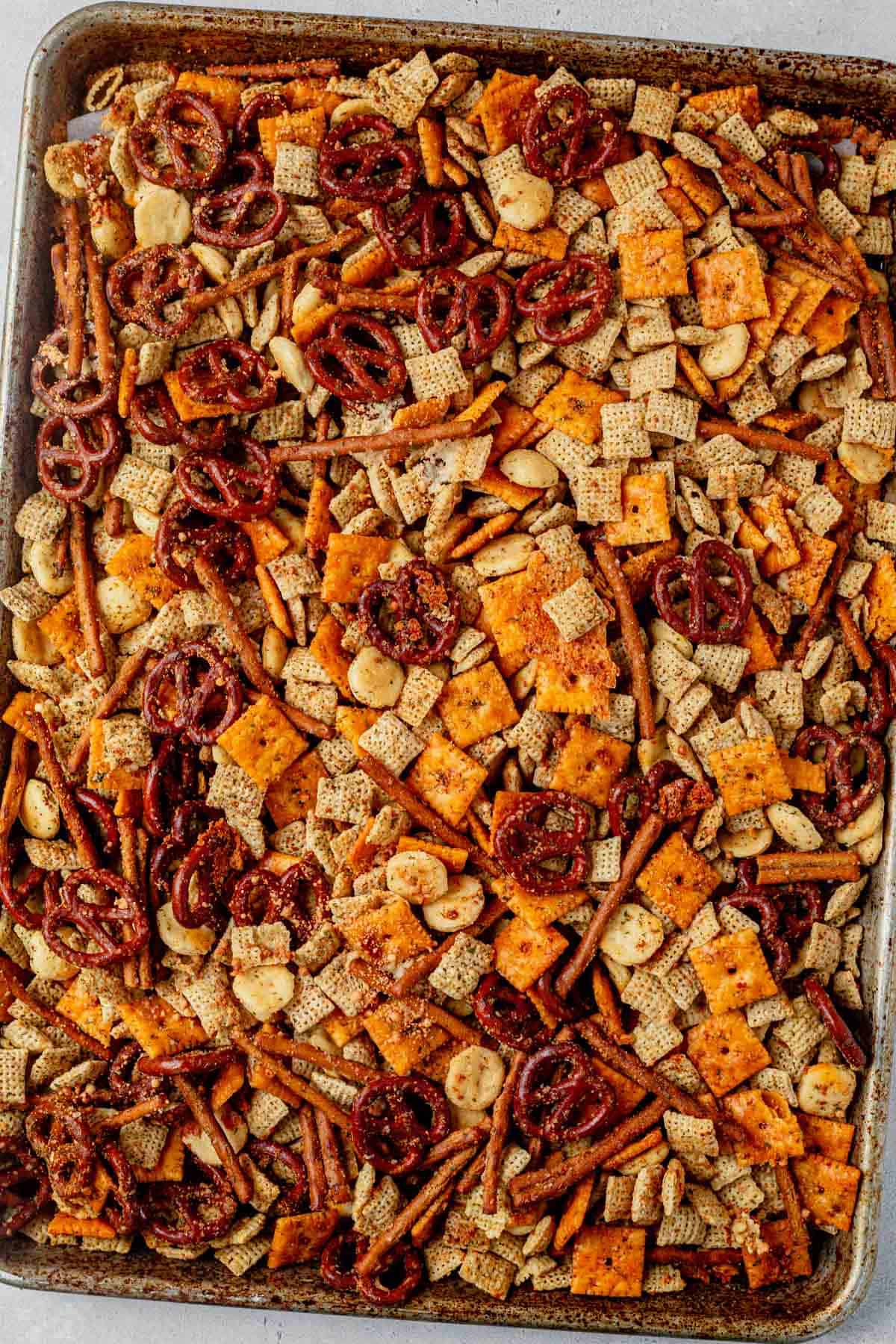 freshly baked homemade ranch chex mix on a baking sheet