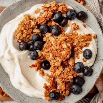 crunchy clusters of almond granola on top of vanilla yogurt