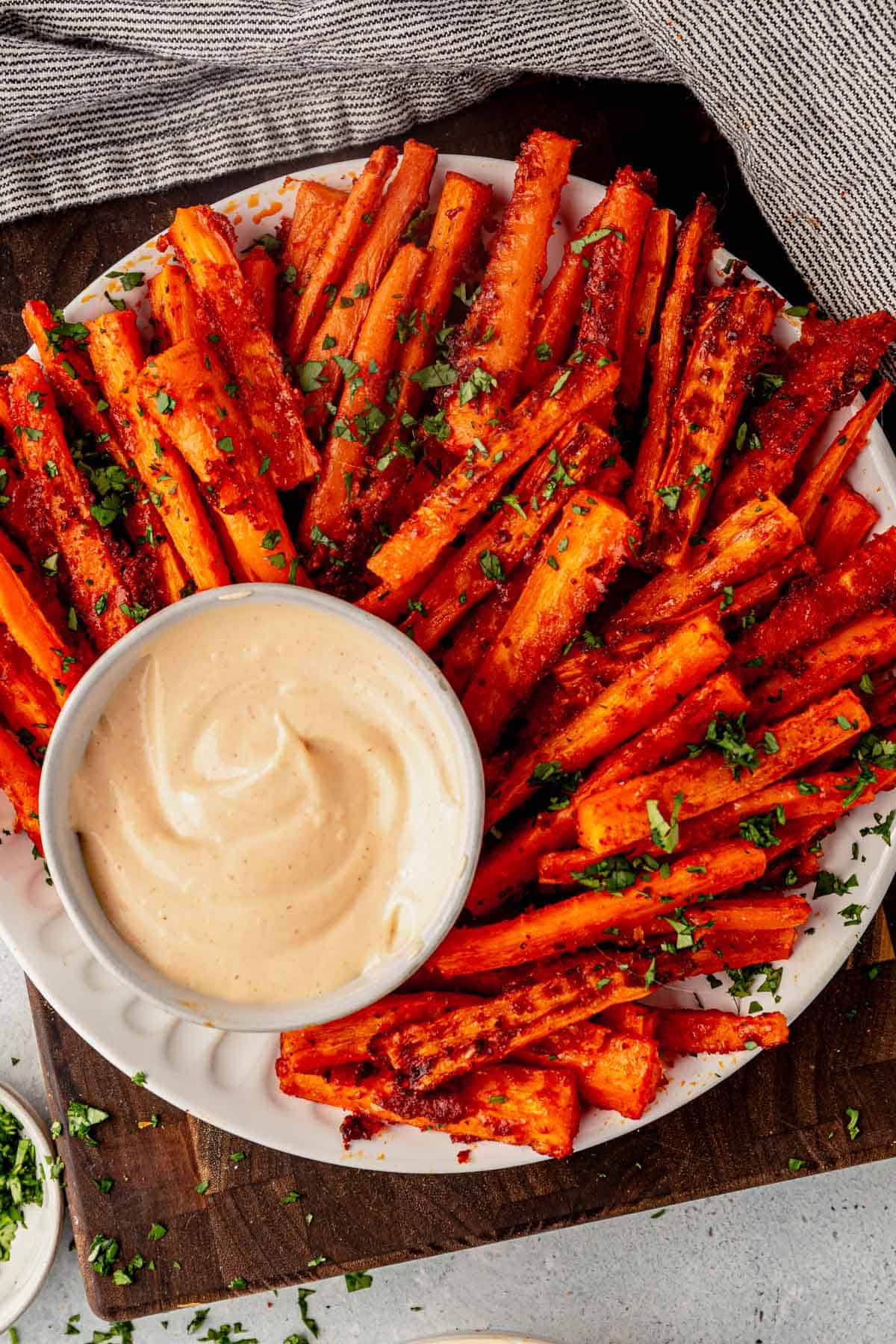 a plate of carrot fries with spicy mayo