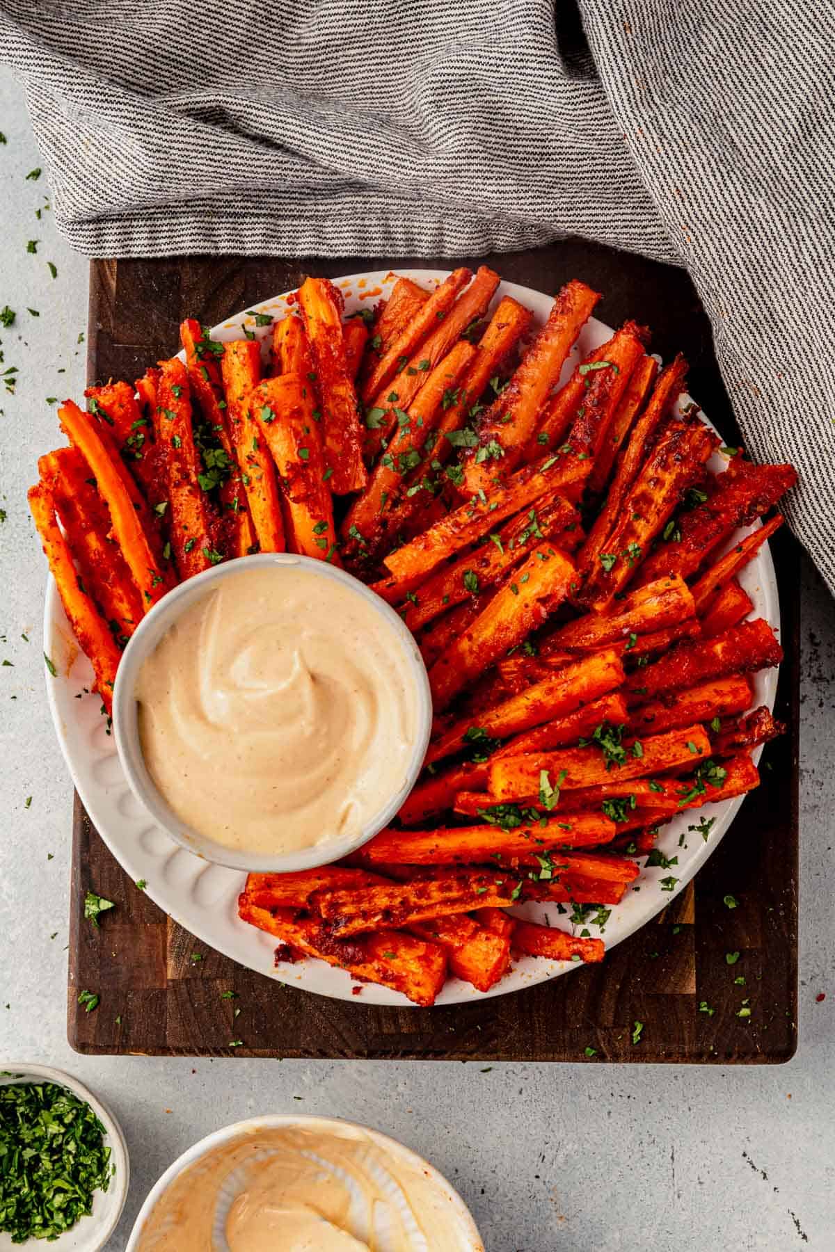 carrot fries on a serving plate with spicy mayo