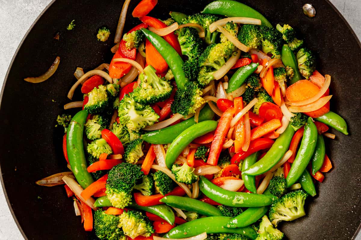 stir fry vegetables cooked in a wok