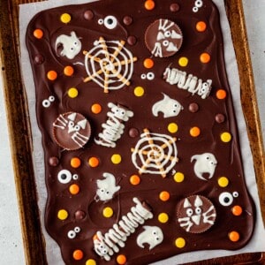halloween bark on a parchment lined baking sheet
