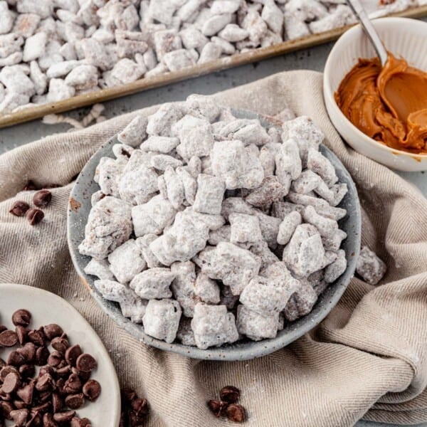 puppy chow without peanut butter in a bowl next to cookie butter in a dish