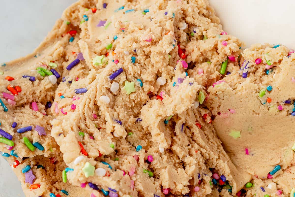 sugar cookie dough with sprinkles in a bowl
