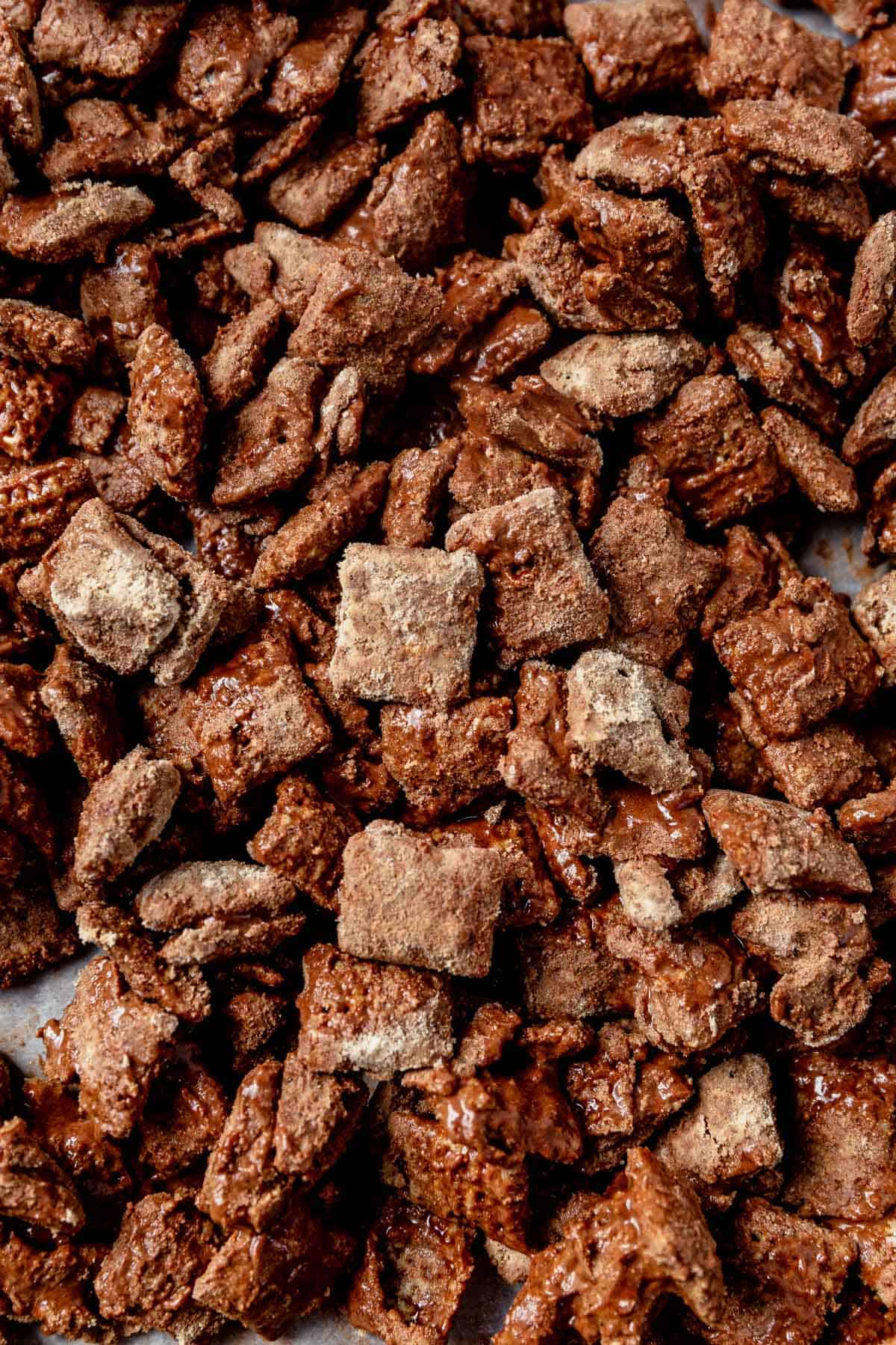 protein puppy chow spread out on a sheet pan
