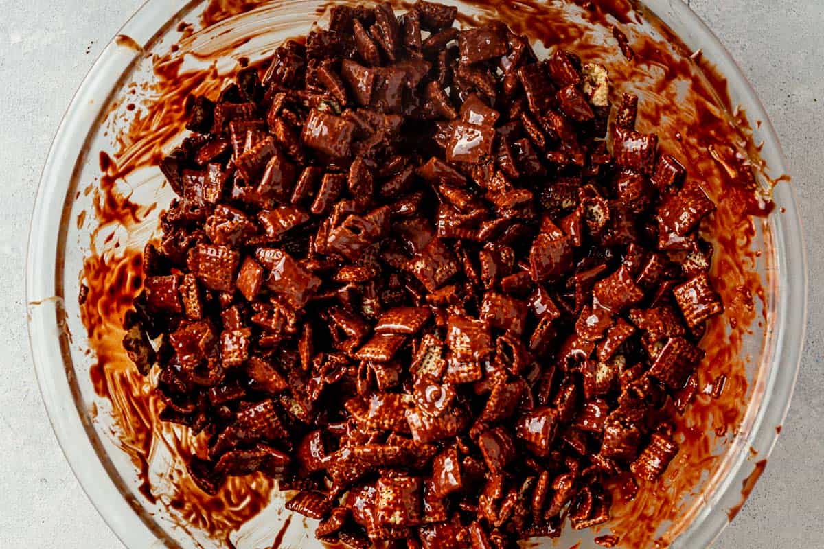 chex cereal covered in melted chocolate and peanut butter