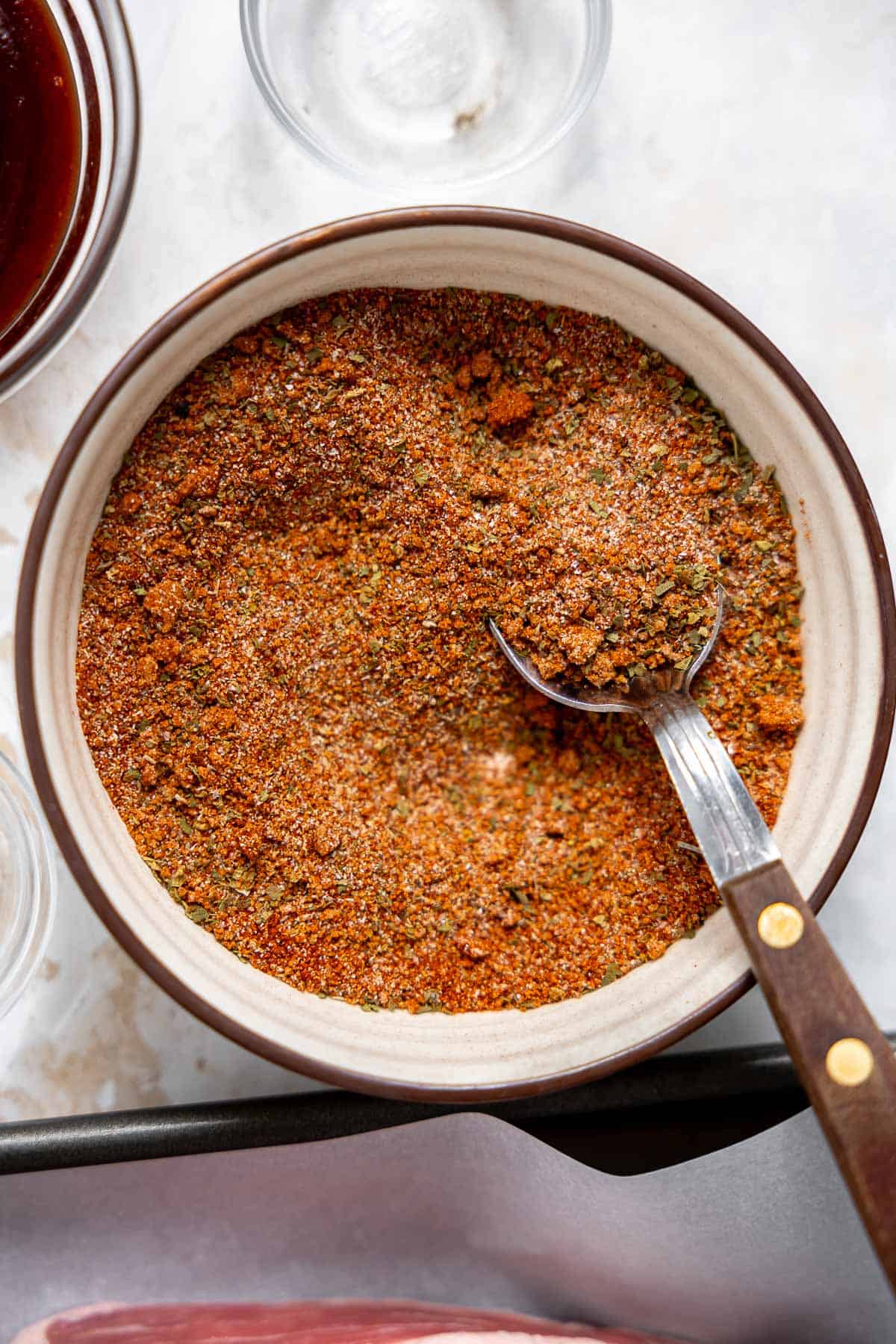 dry rub for ribs in a mixing bowl.