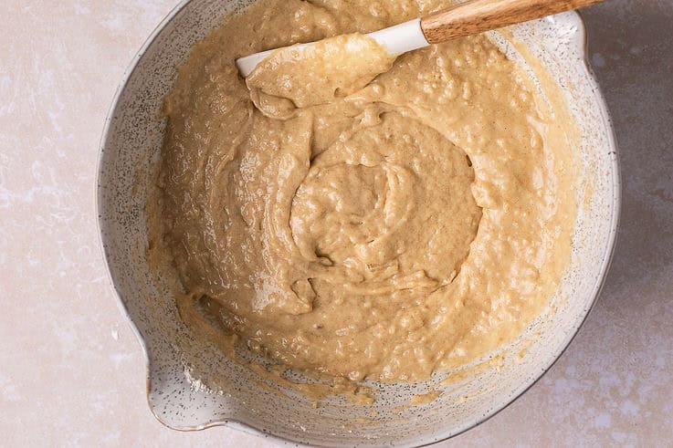 coffee cake muffin batter resting in a mixing bowl.