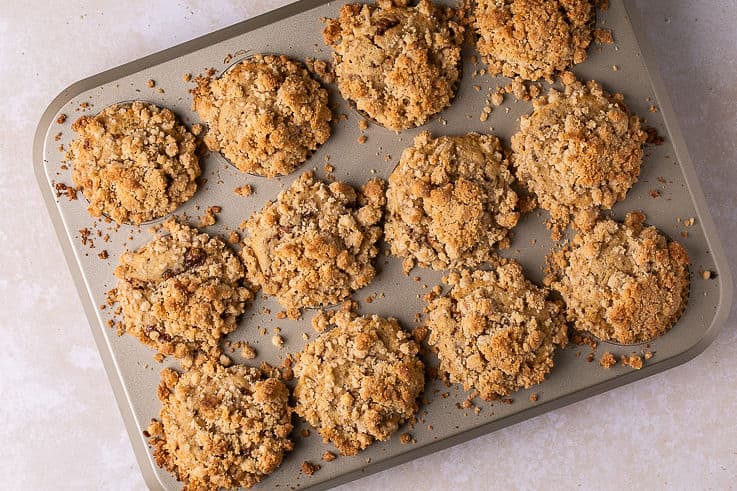 freshly baked coffee cake muffins cooling in the pan