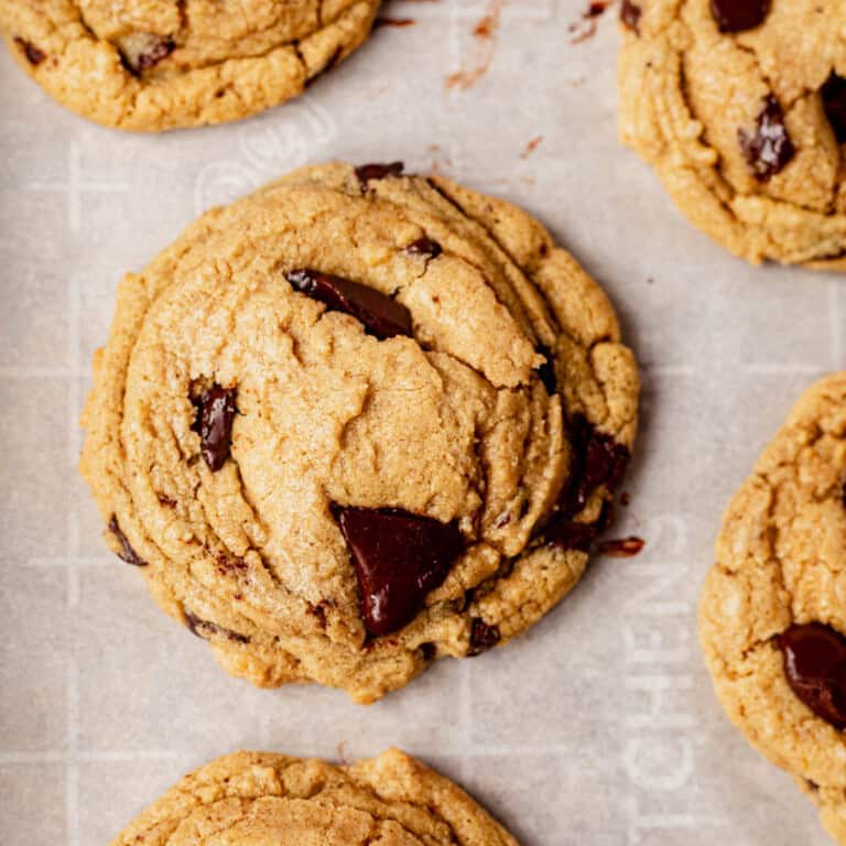 oat flour cookies cooling on a baking sheet