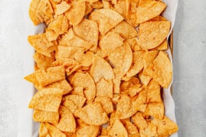 tortilla chips on a baking sheet