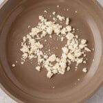 feta cheese crumbled on a skillet