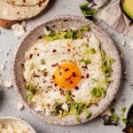feta fried egg on a plate