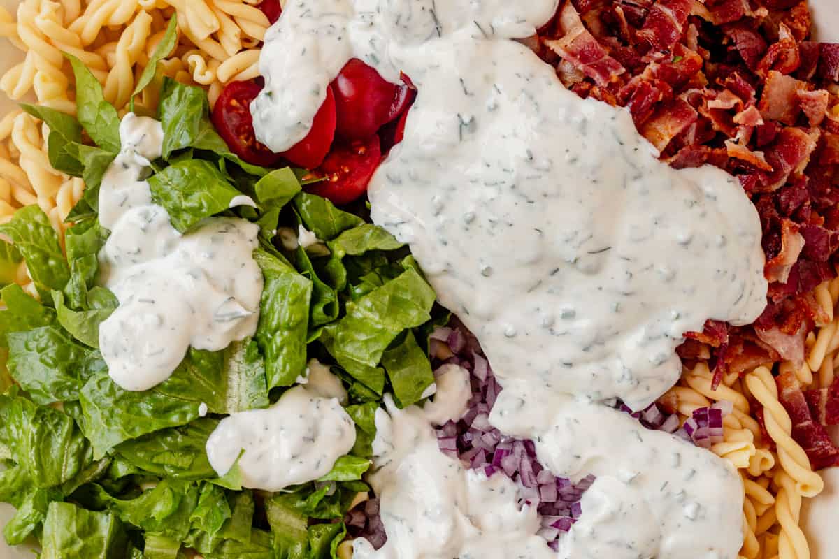blt pasta salad topped with ranch dressing