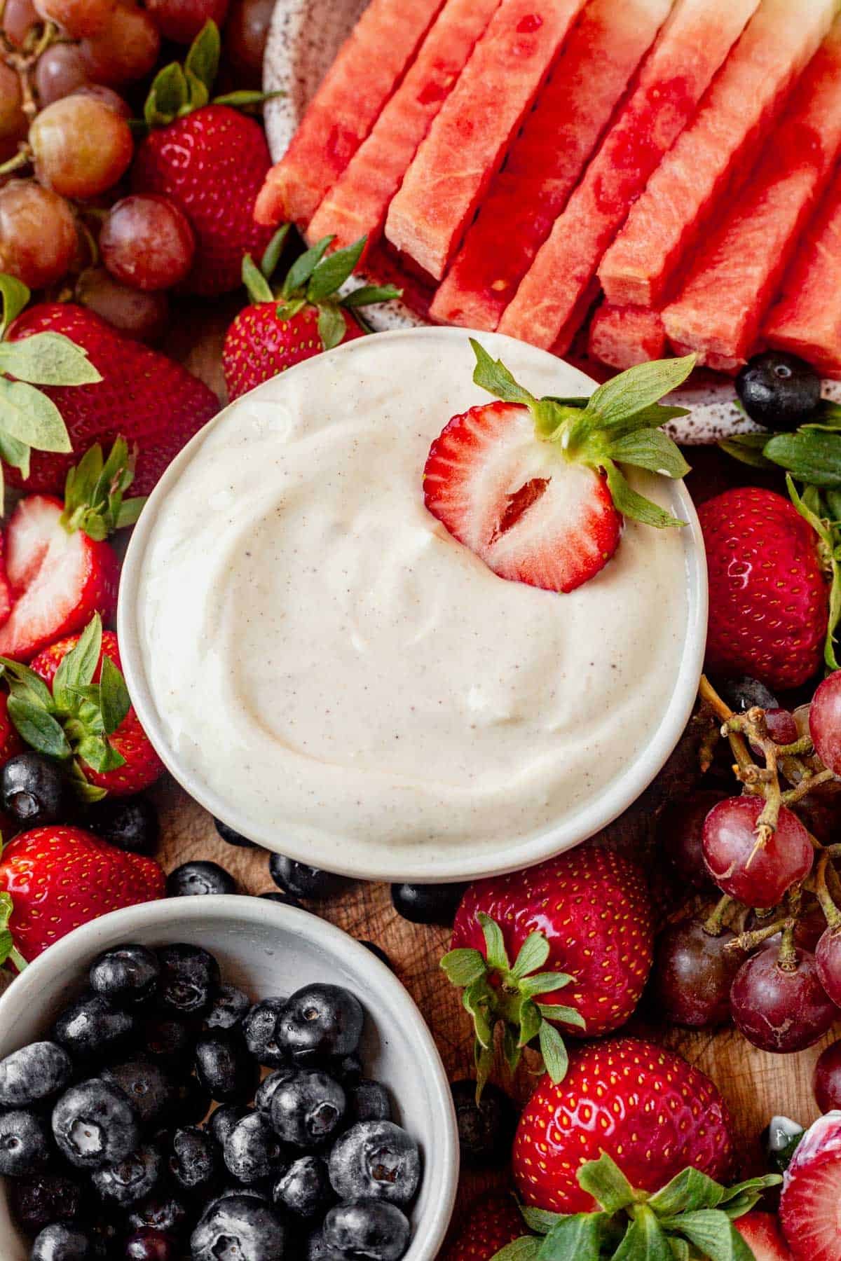 yogurt dip for fruit in a bowl with strawberries