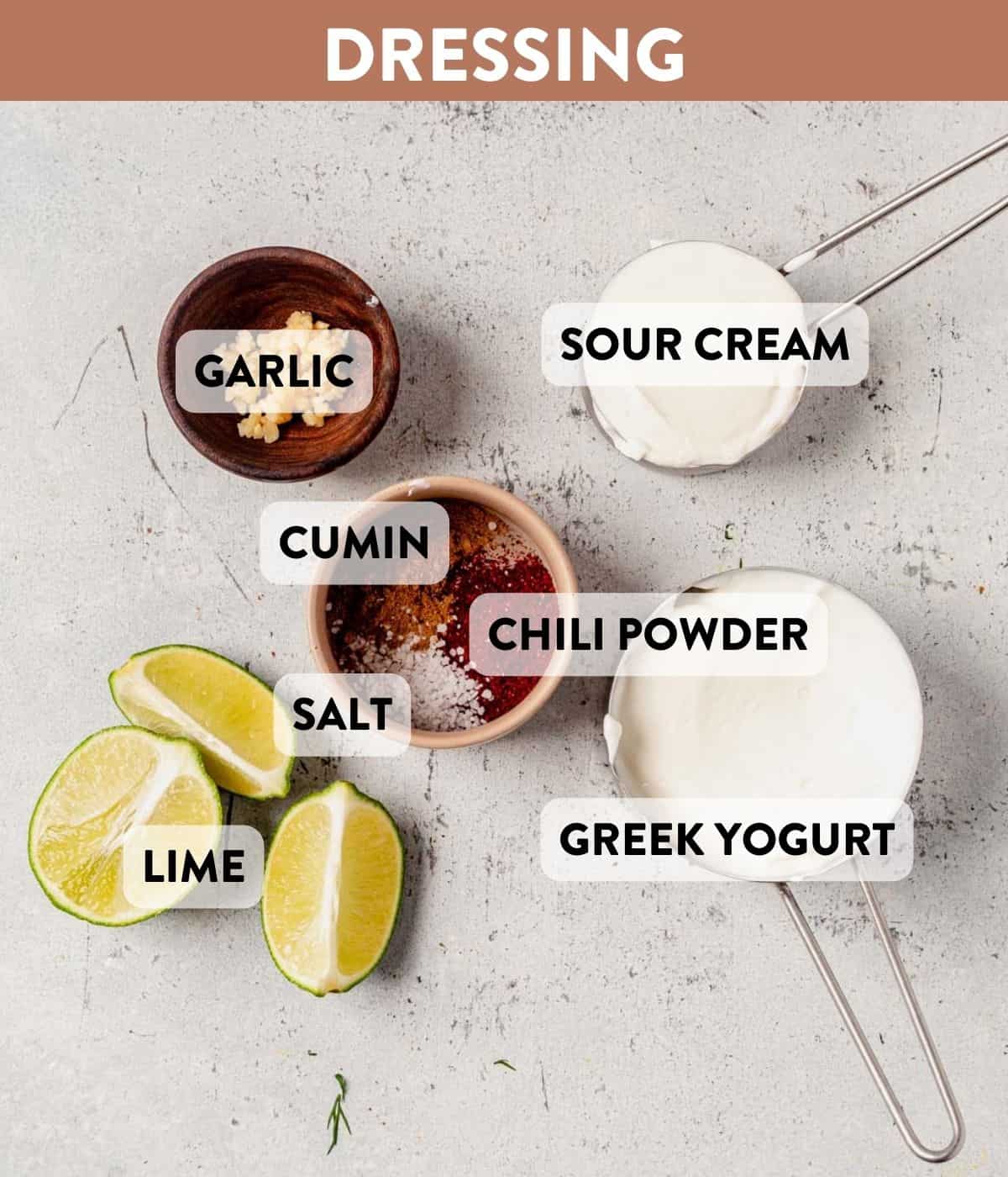 greek yogurt, sour cream, lime, garlic, and mexican spices on a counter