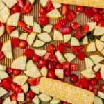 chopped vegetables on a sheet pan before roasting