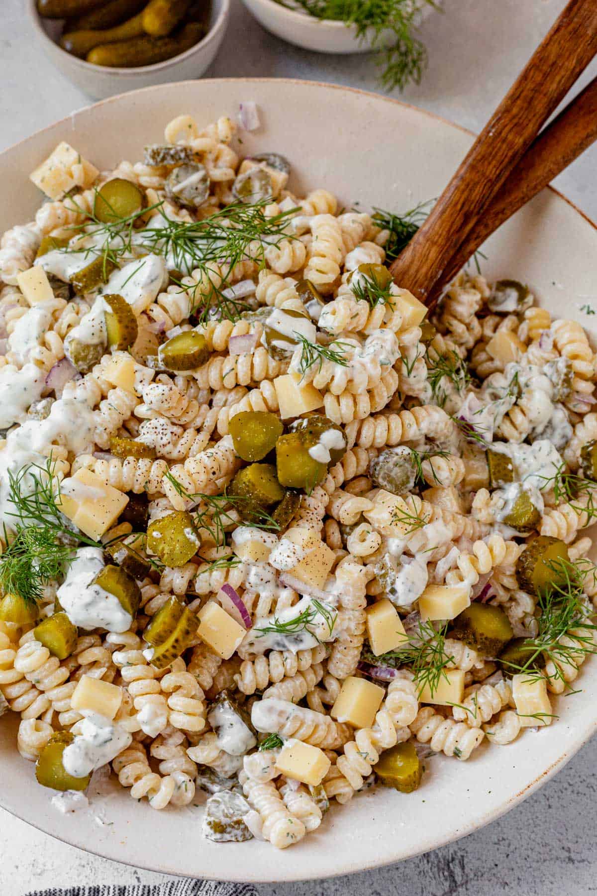 dill pickle pasta salad in a serving bowl