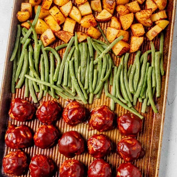 bbq turkey meatballs on a sheet pan with green beans and potatoes