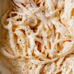 cottage cheese alfredo sauce with noodles in a pan