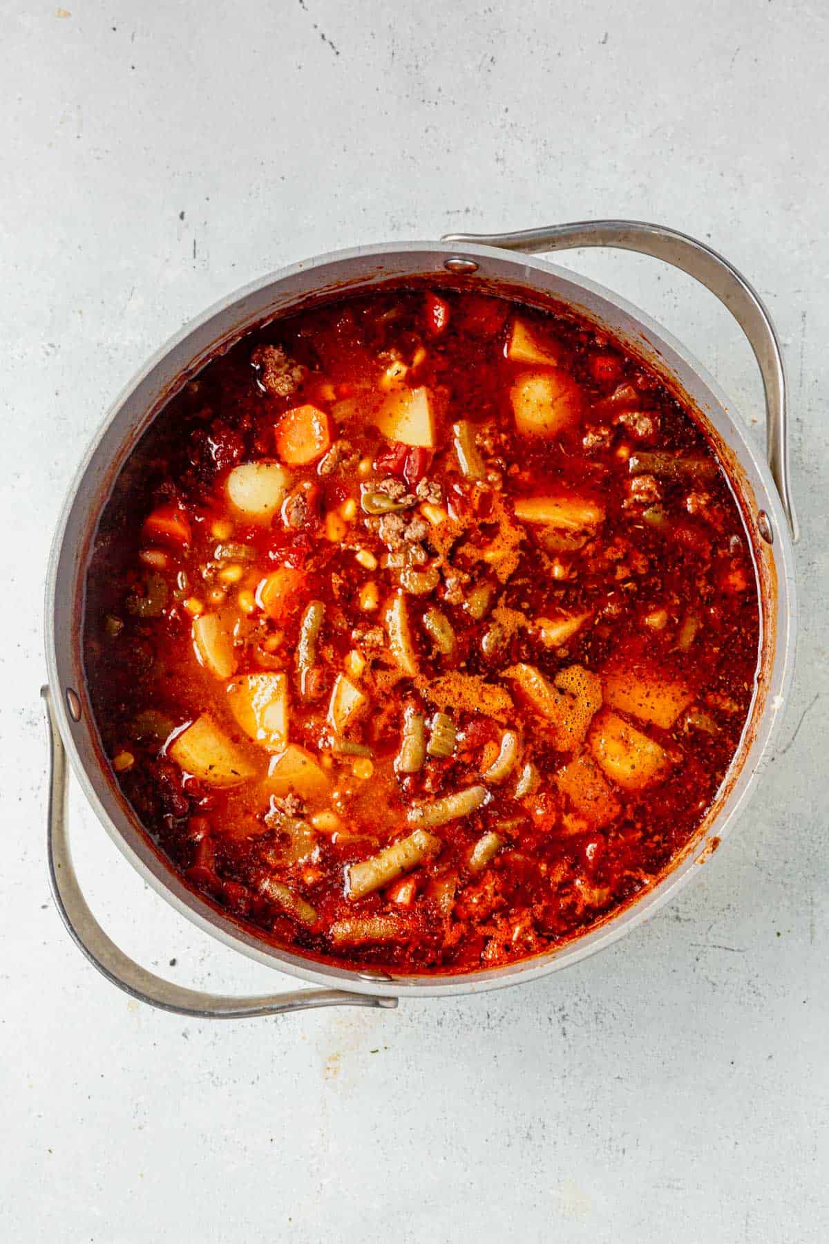 cowboy hamburger soup in a large soup pot.