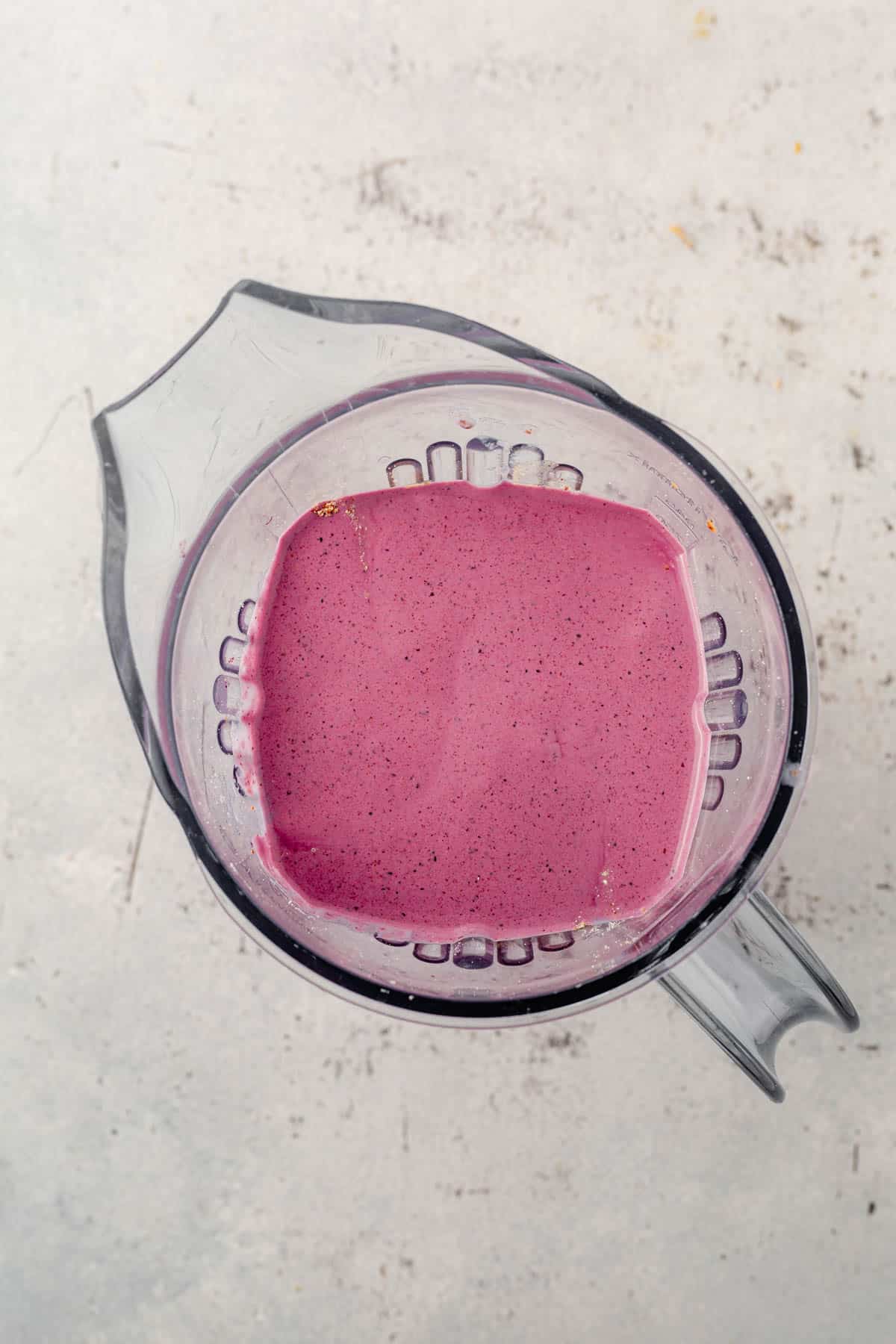 raspberry blueberry smoothie in a blender.