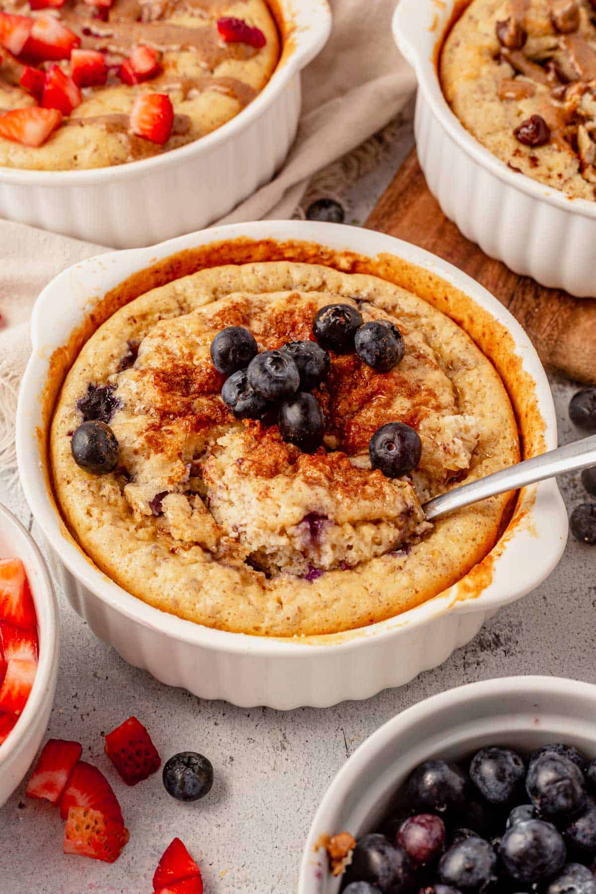 a spoon in a bowl of baked protein pancakes.