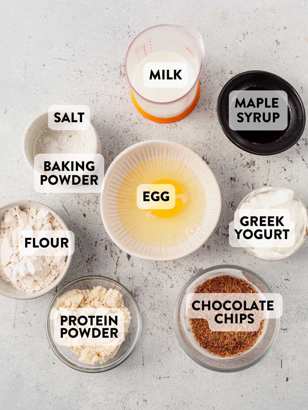 ingredients for baked protein pancakes bowls on a countertop.