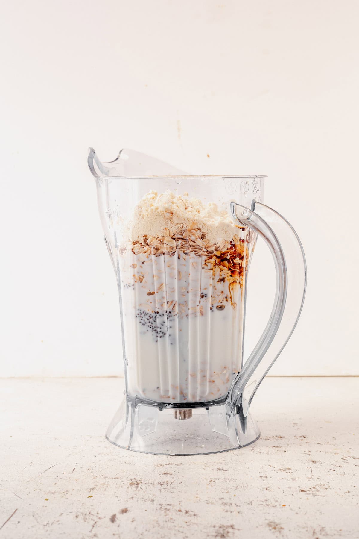 protein overnight oats ingredients in a blender.