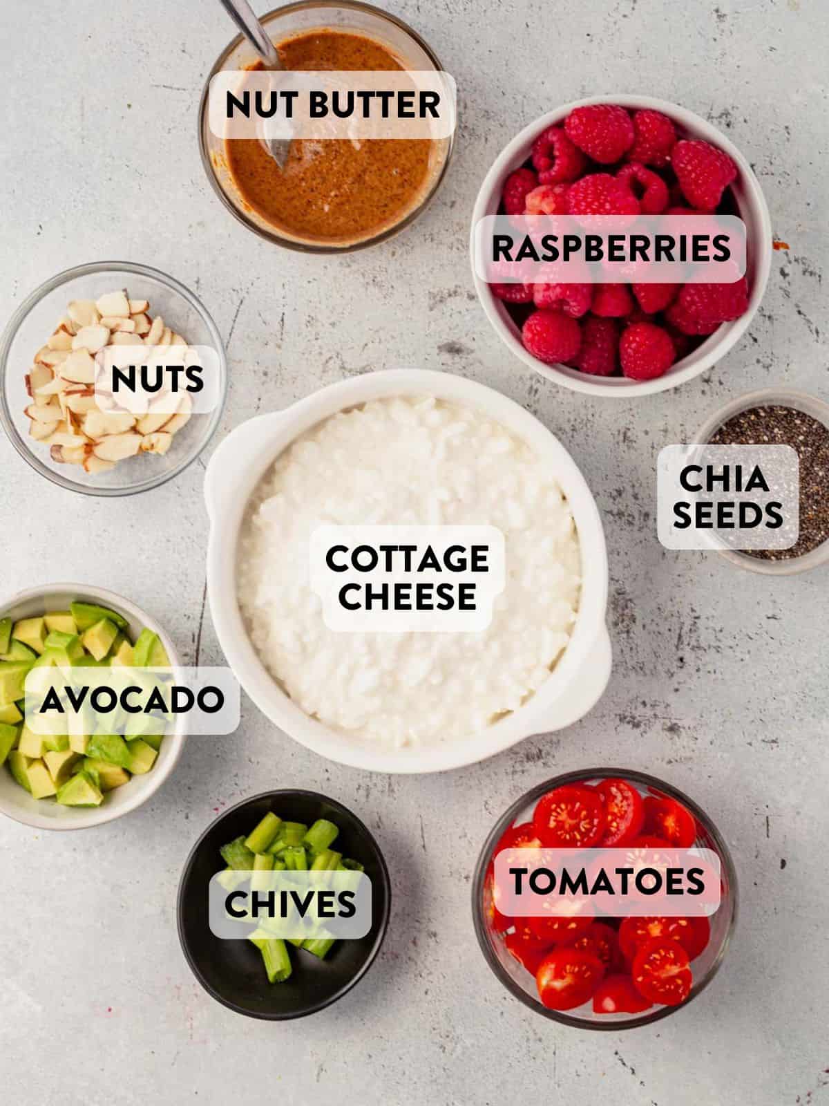 sweet and savory cottage cheese breakfast bowl ingredients on a countertop.