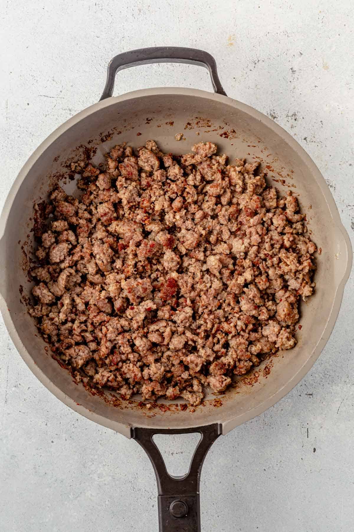 cooked breakfast sausage in a skillet.