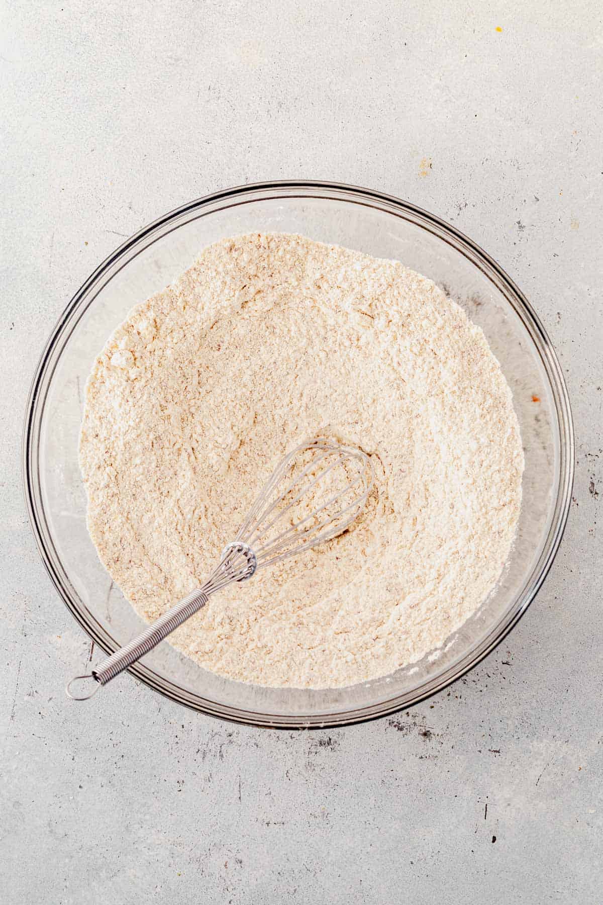 dry ingredients for protein cinnamon rolls in a bowl.