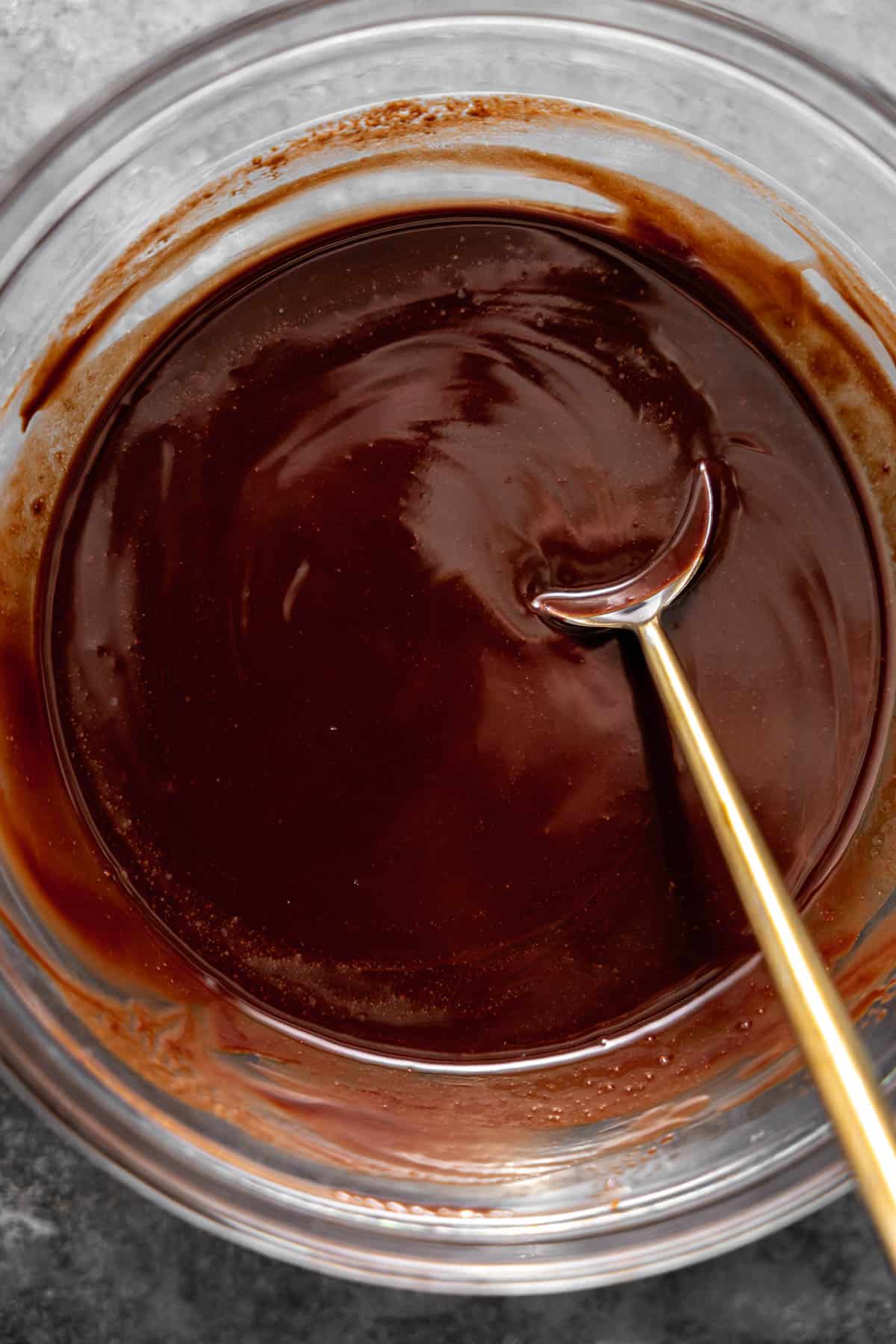 melted chocolate and butter in a bowl.