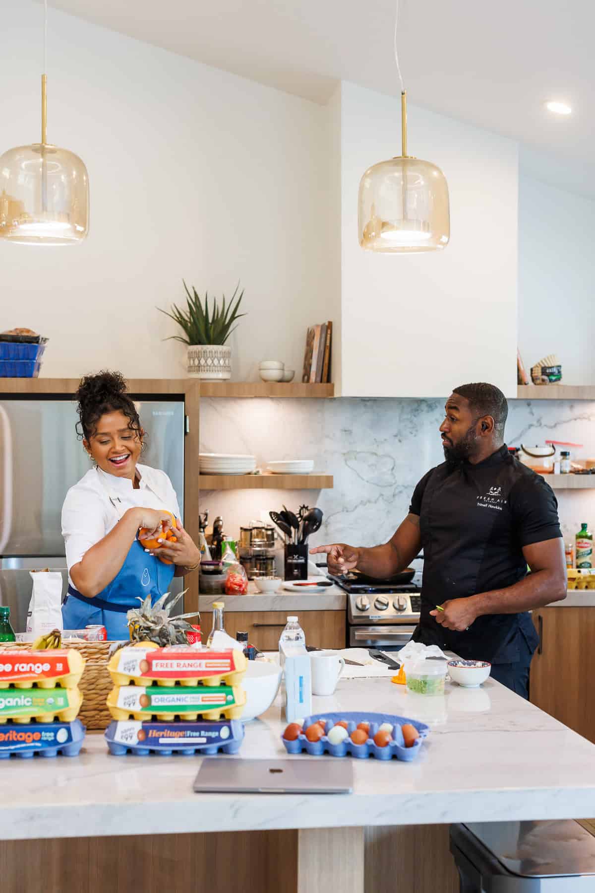 happy egg chefs cooking in the kitchen.