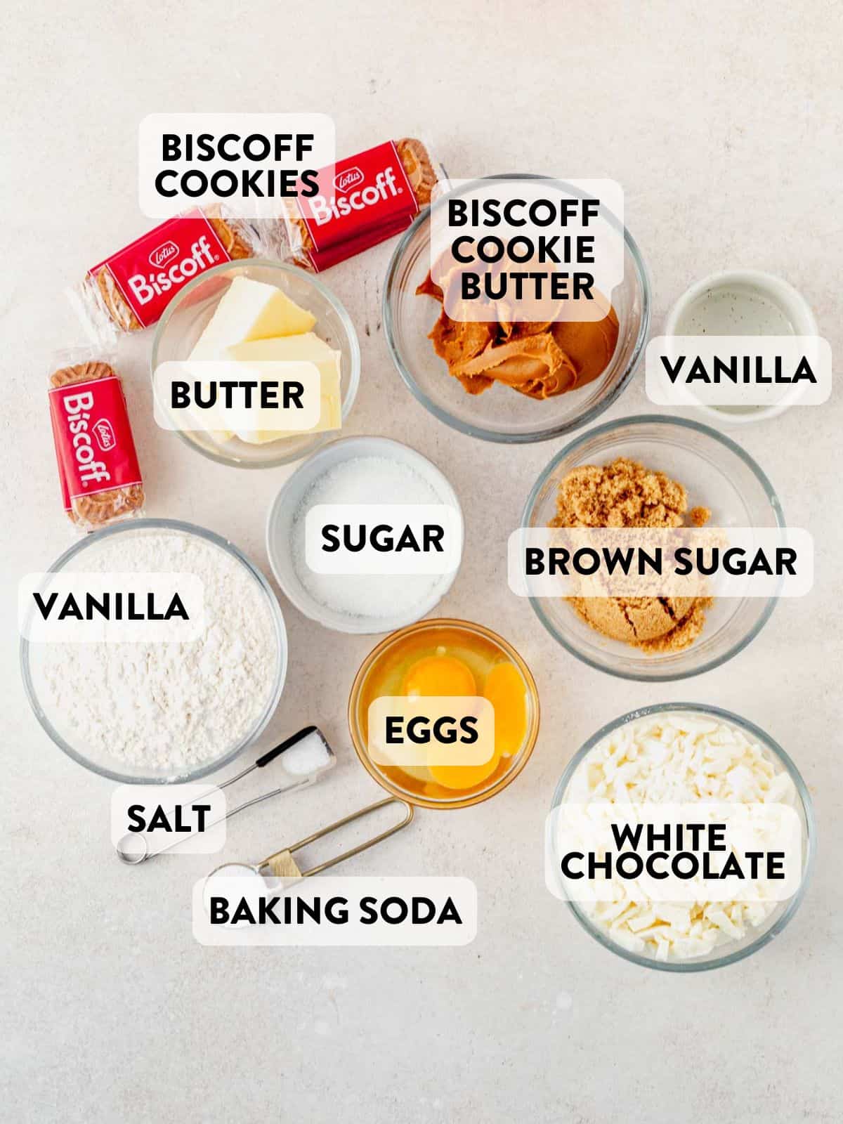 ingredients for biscoff white chocolate chip cookies on a countertop.