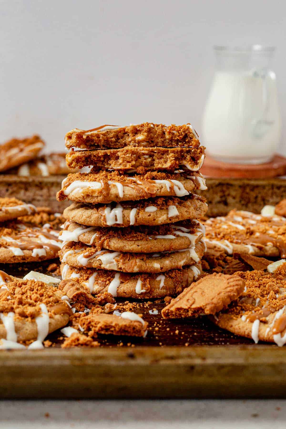 a stack of biscoff cookies on a cookie tray.