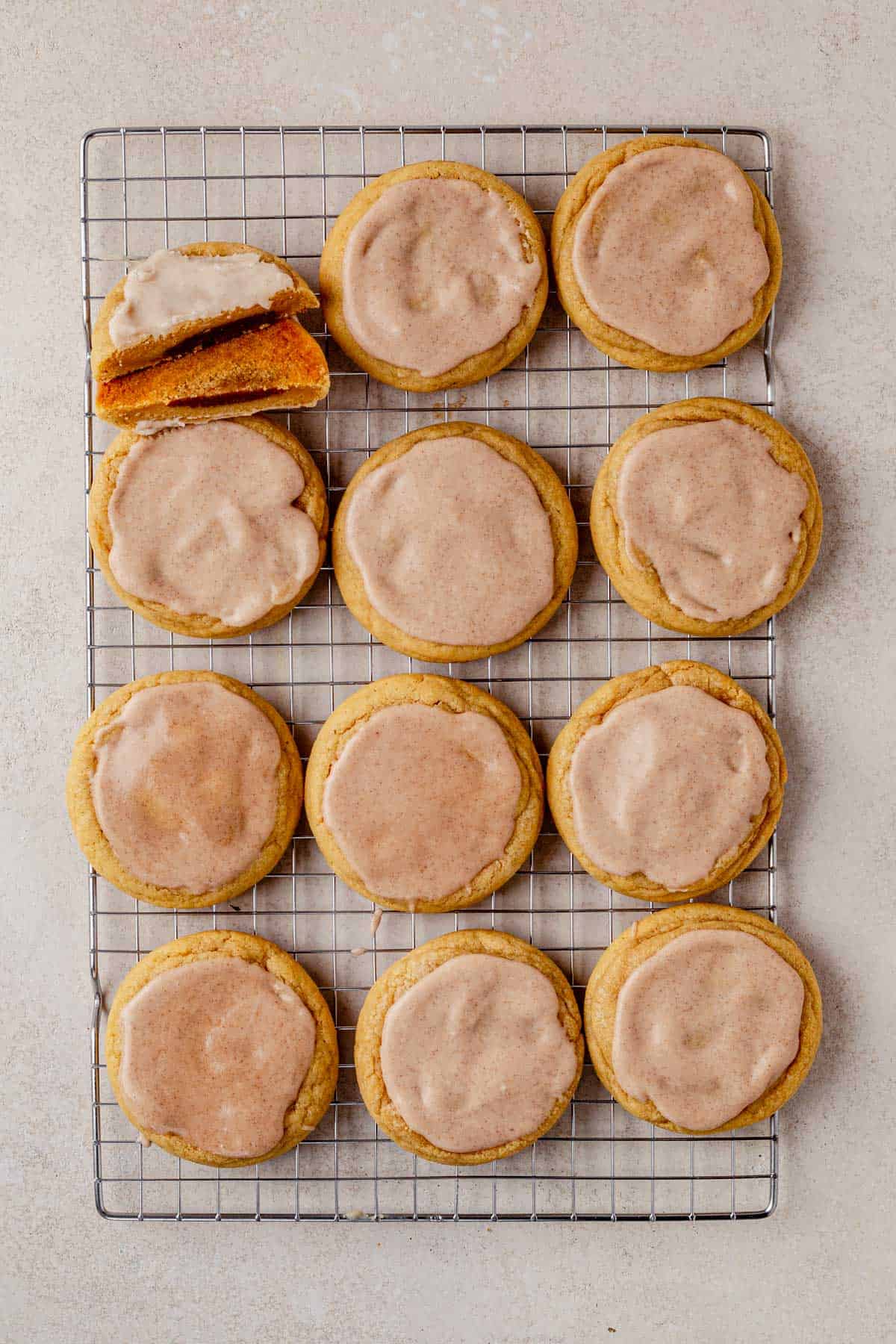 frosted brown sugar pop tart cookies cooling on a wire rack.