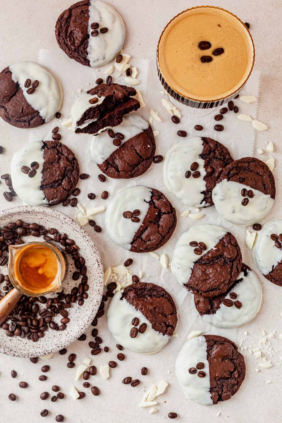 espresso martini cookies on a countertop with an espresso martini next to them.