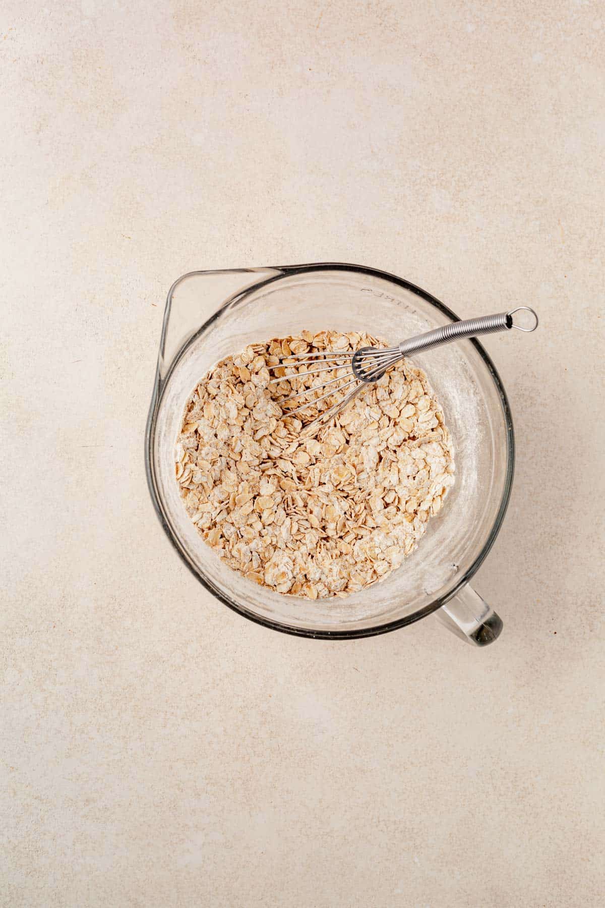 dry ingredients for oatmeal cookies in a mixing bowl.